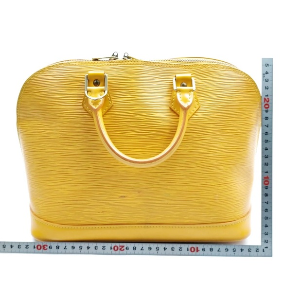 Louis Vuitton LV Hand Bag M52149 Alma
Yellow Epi 428509 - Picture 2 of 6